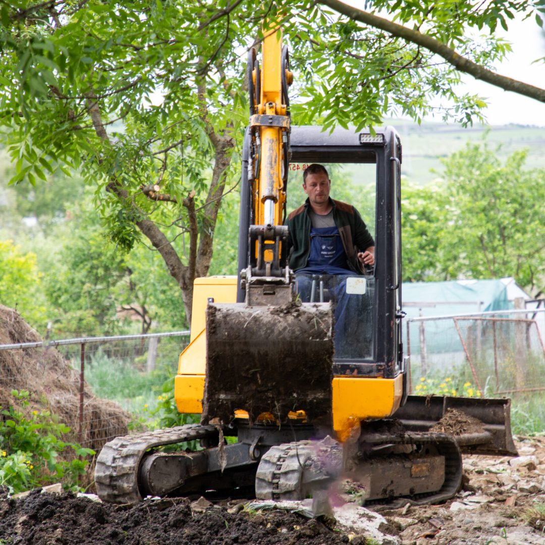 excavator with Bucket lift up are digging the soil in the construction site on